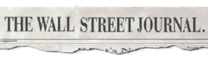 The Wall Street Journal printed in capitol letters on a newspaper